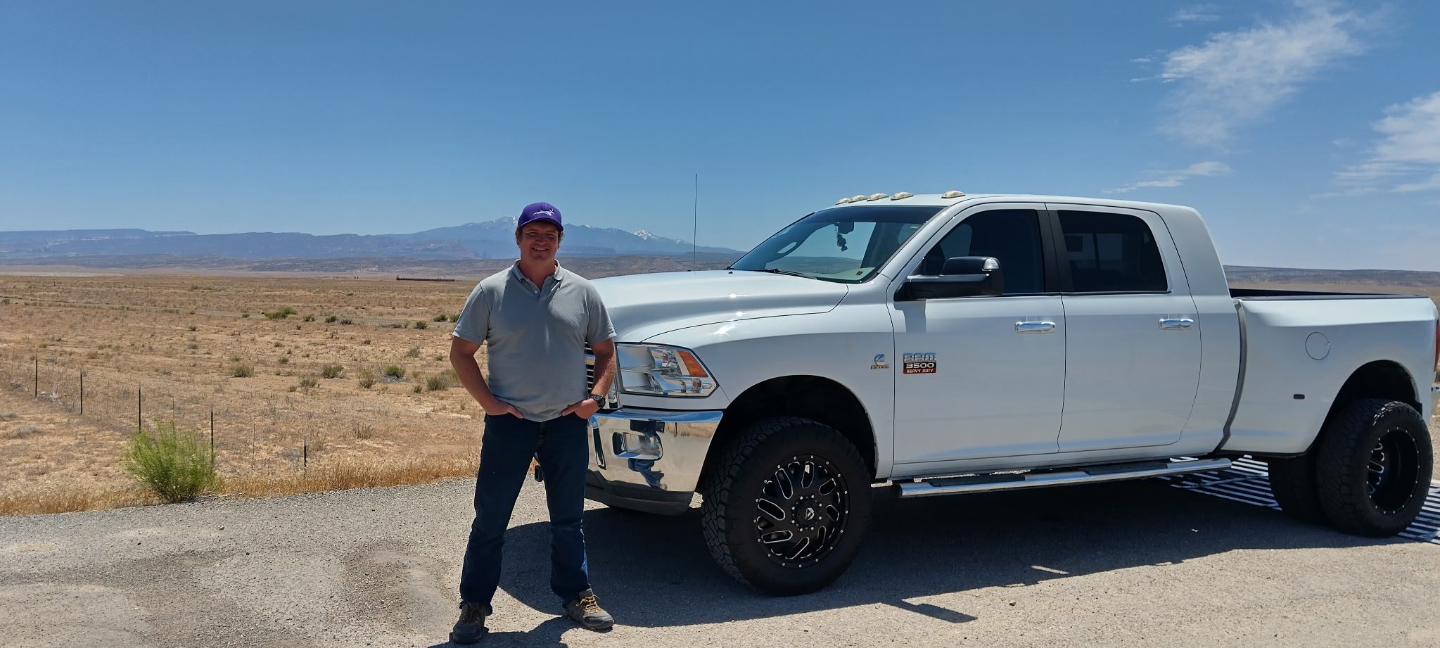 AJ Lydon with a client's truck in the Utah desert