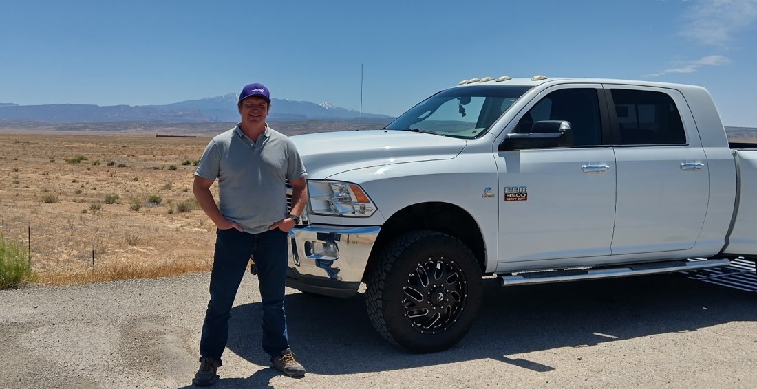 AJ Lydon, Lead Broker at Phoenix Car Brokers, with a Ram 3500