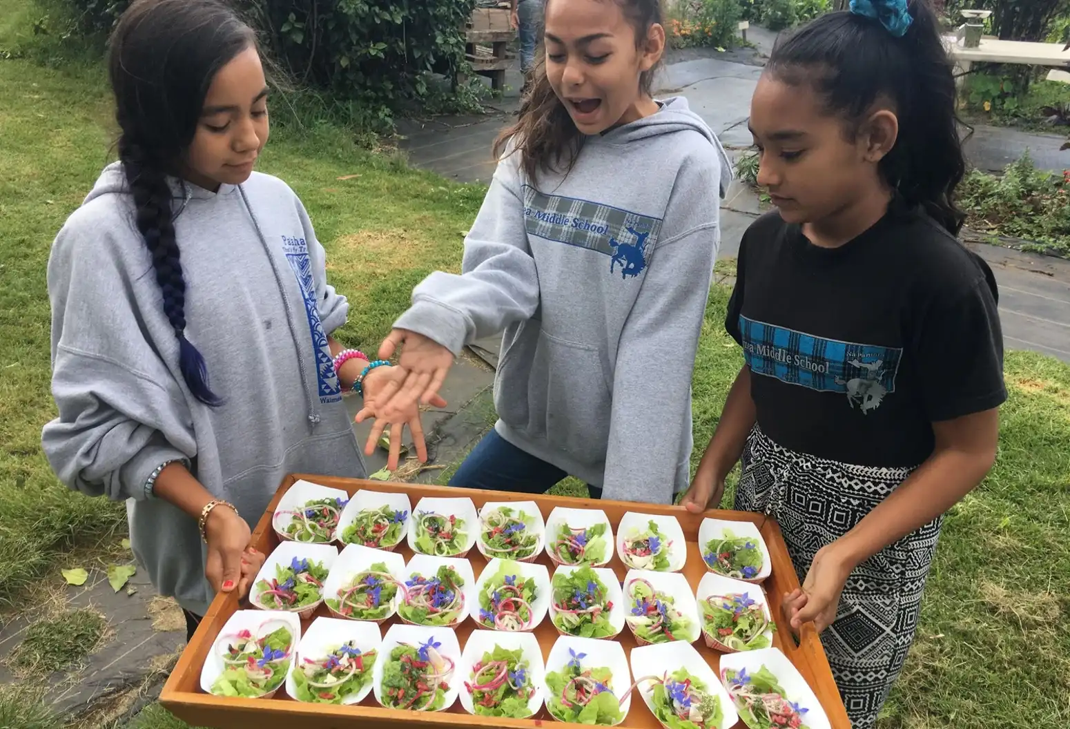 Waimea Middle school students with Malaʻai grown produce