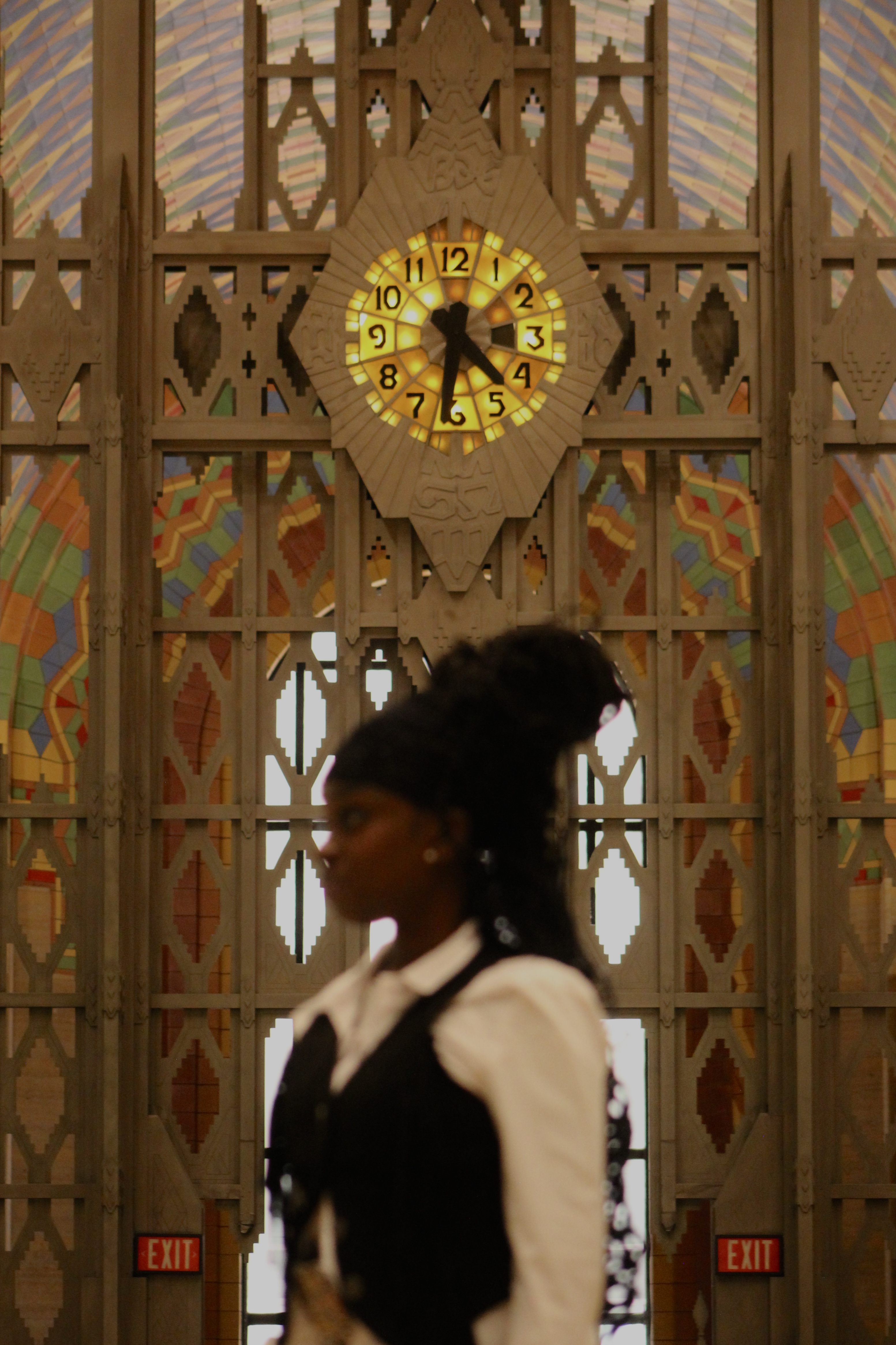 Queen Sabrina blurred in front of the clock at the Guardian Building in Detroit, MI.