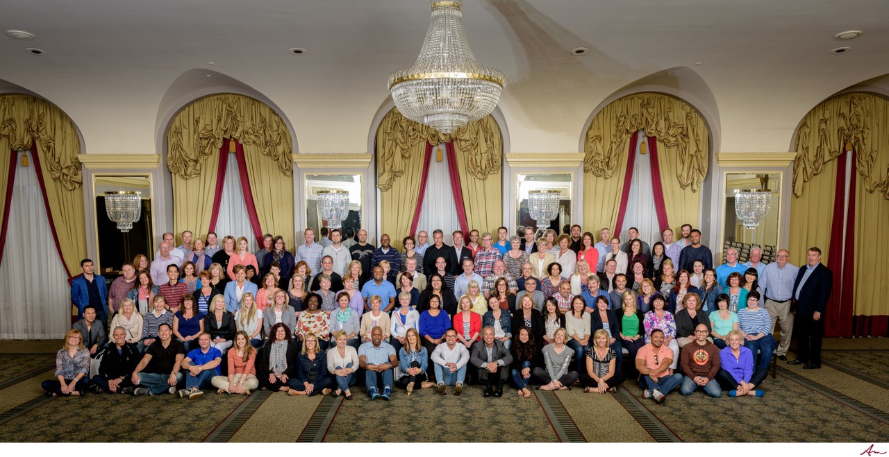 Corporate group photo of more than 100 people in the Westin Nova Scotian ballroom, Halifax