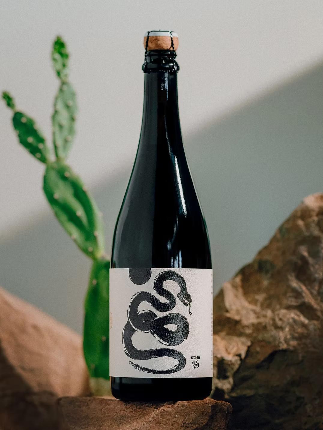 Dry Cut cider bottle on rocks