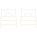 Icon of two single beds side by side with pillows and bedsheets.