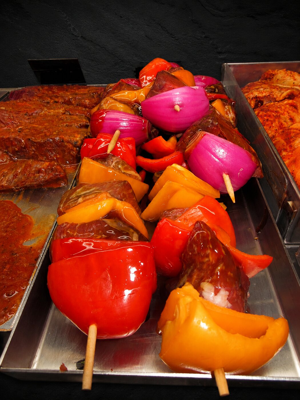 Marinated beef and vegetable skewers in the display case at Deenihan's Prime Cuts.