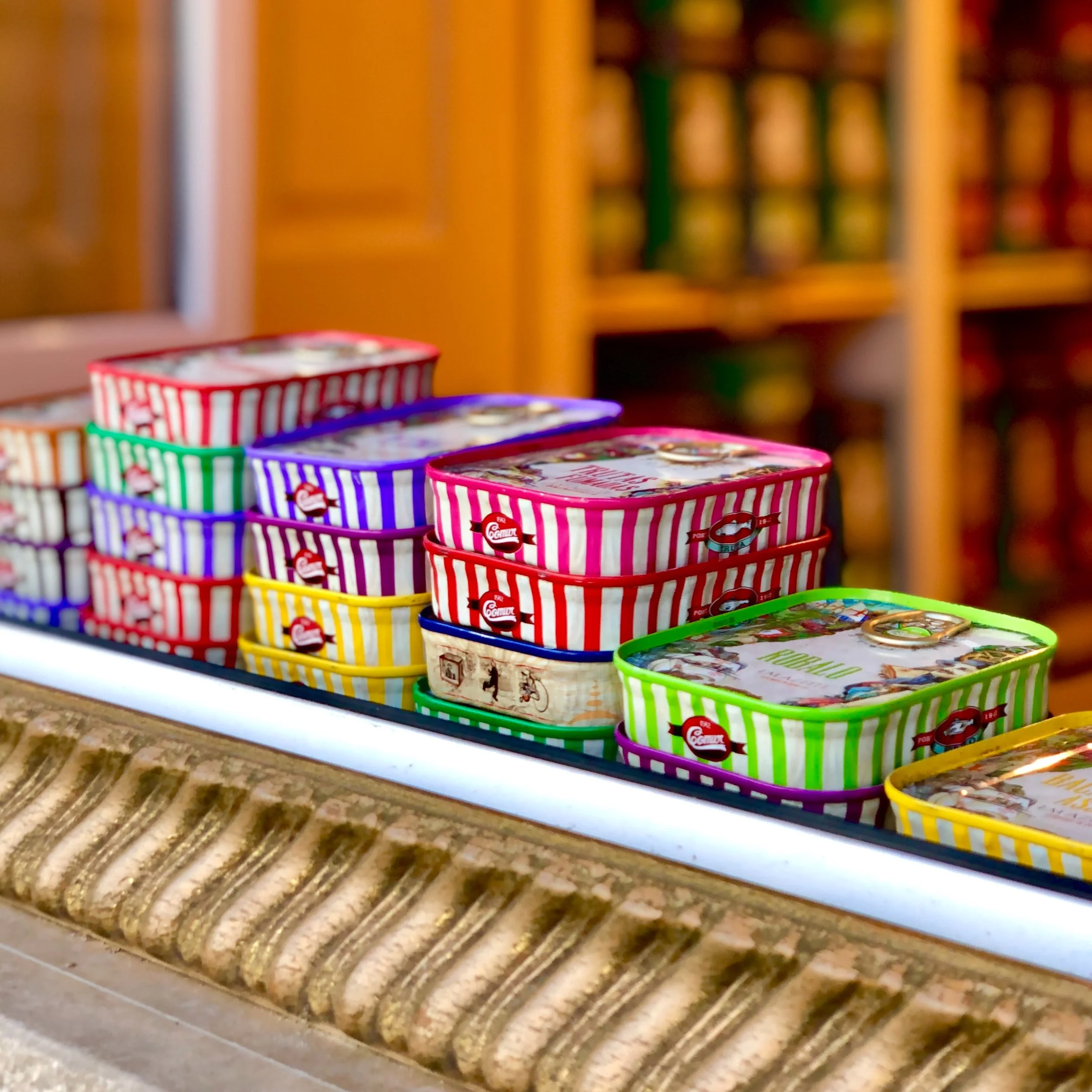 Budget-friendly seafood items displayed at a grocery store.