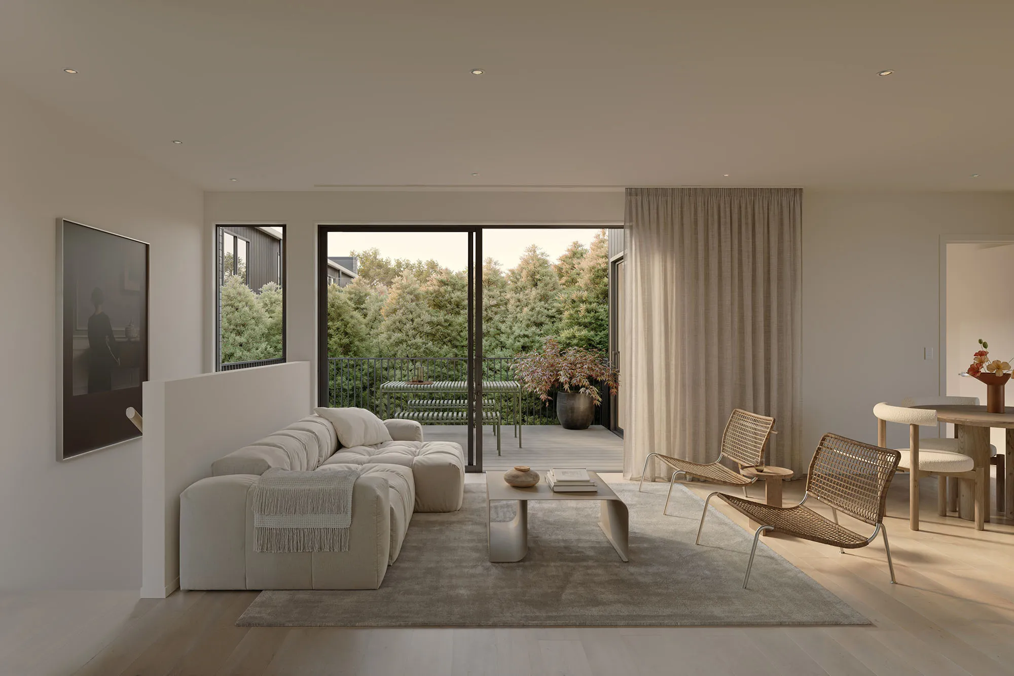 Enclave living room opening to a terrace with treetop and native bush outlooks