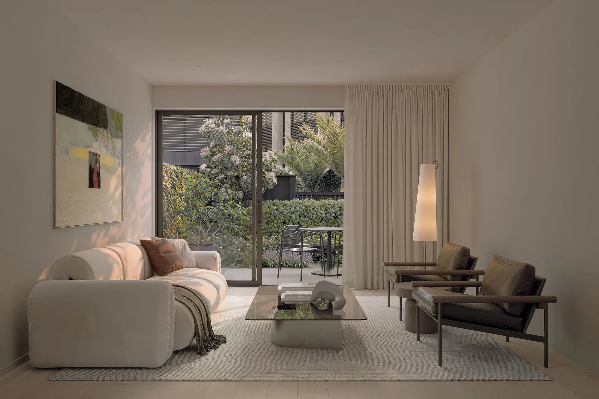 Light-filled Enclave living room opening to a planted courtyard through sliding doors