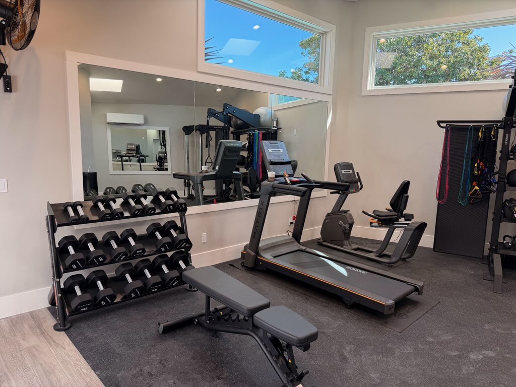 Fitness center with cardio and weight lifting equipment