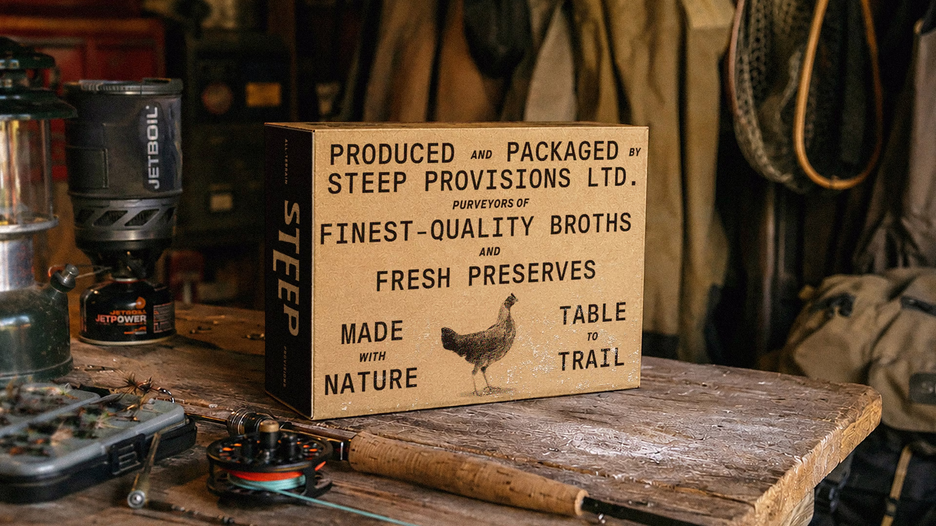 Steep packaging displayed on a workshop bench with product messaging and illustrations.