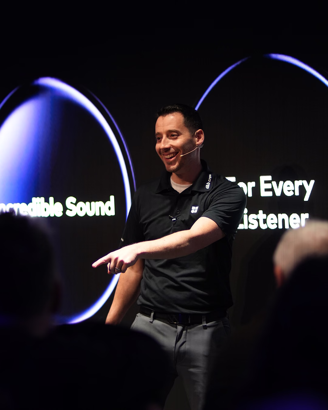 Speaker presenting d&b’s “Every Sound, Every Listener” concept on stage.