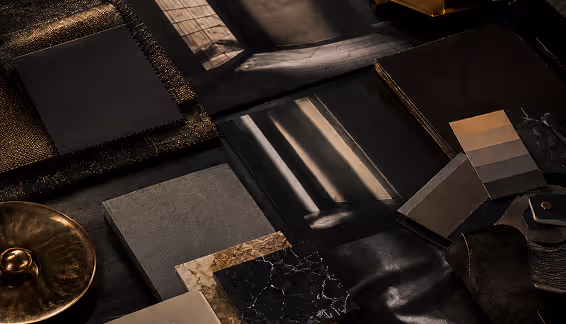 Fabric and material swatches lit by dramatic diagonal light beams