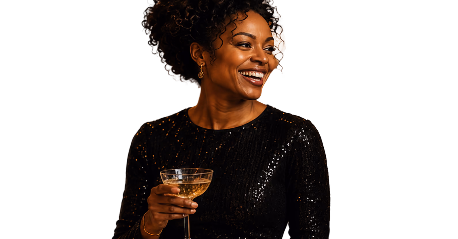 Woman in a black sequin gown smiling and holding a champagne coupe