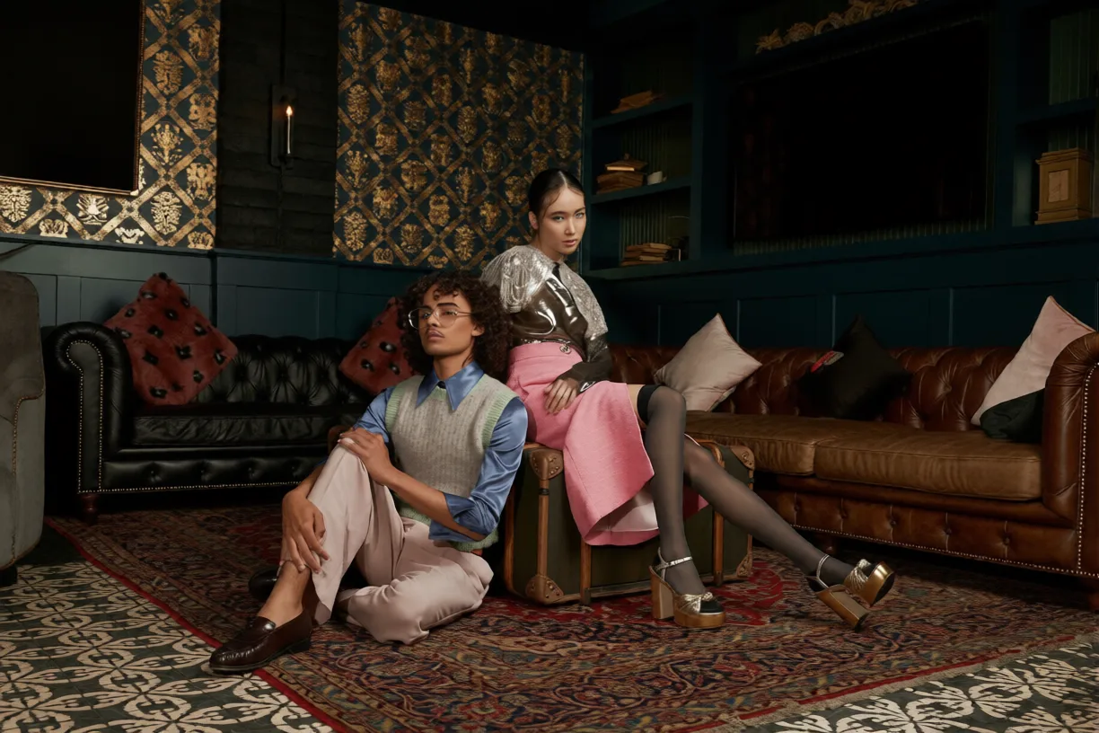 A couple is sitting in the living room