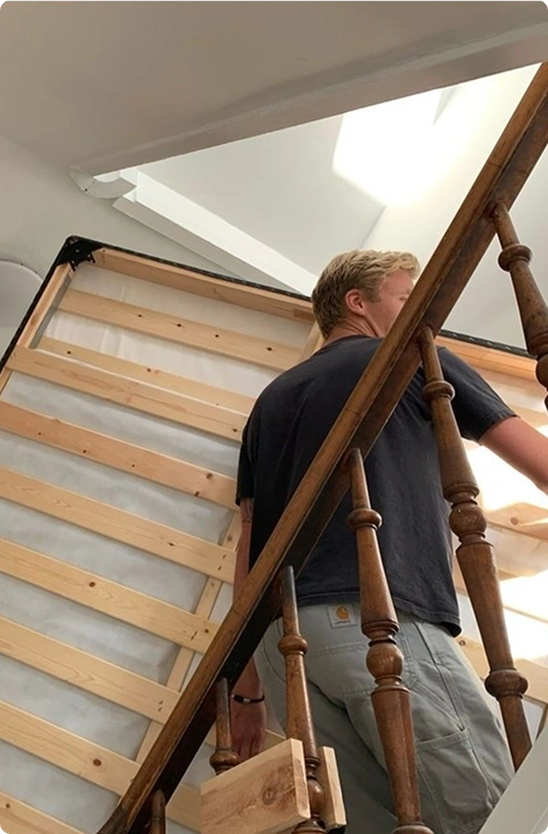 A guy is building a straicase