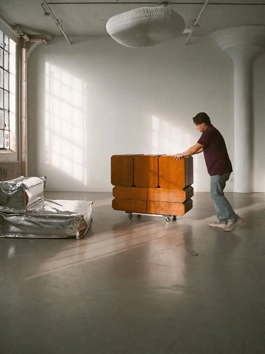 Yugo specialist moving furniture on site