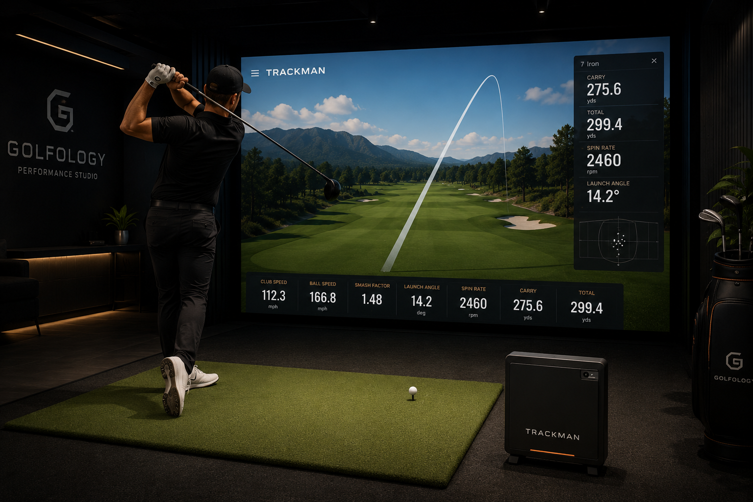 Golfer in indoor studio swings club toward screen displaying golf shot data and trajectory.