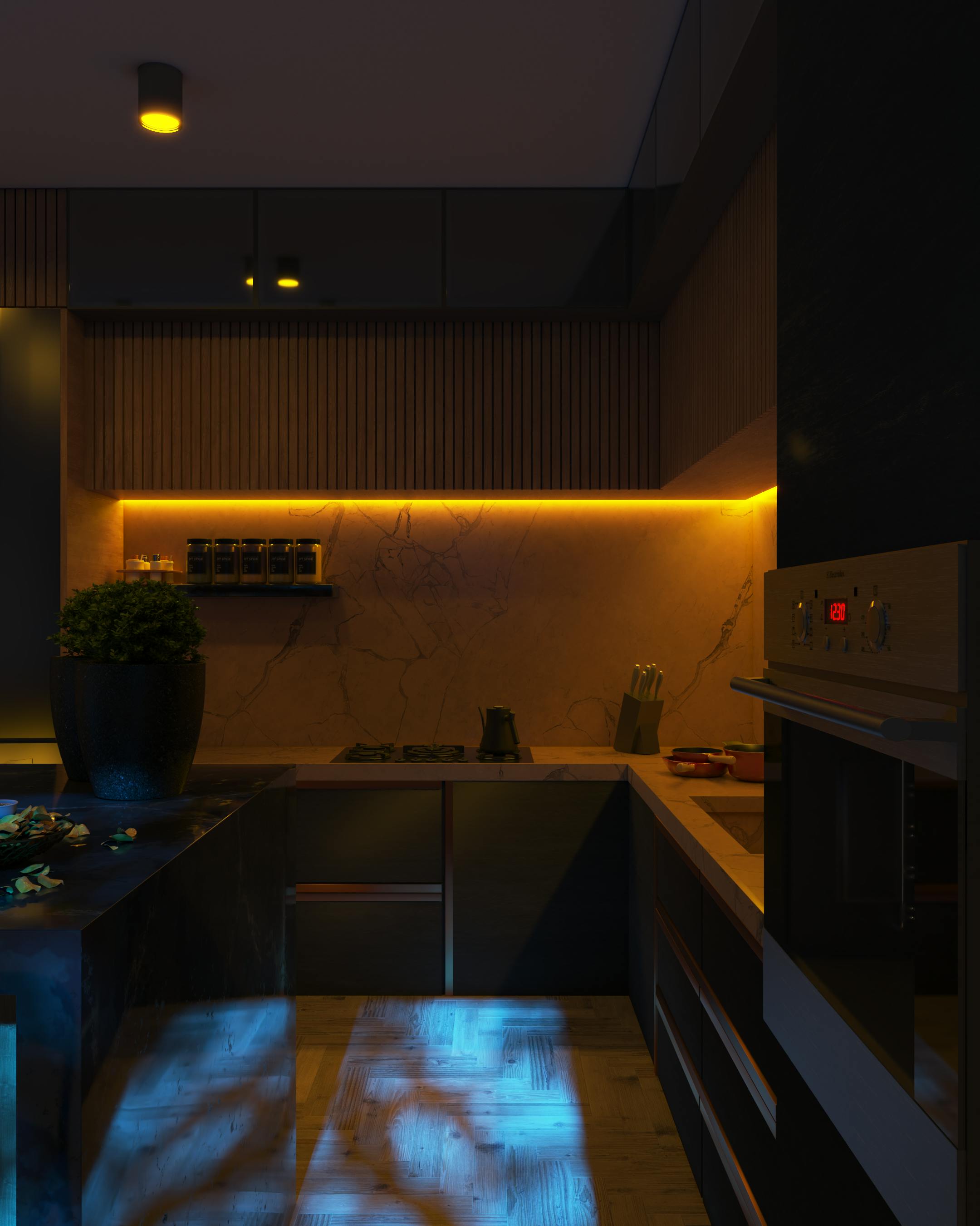Modern kitchen with dark cabinets, marble countertops, warm under-cabinet lighting, and a built-in oven showing 12:30.
