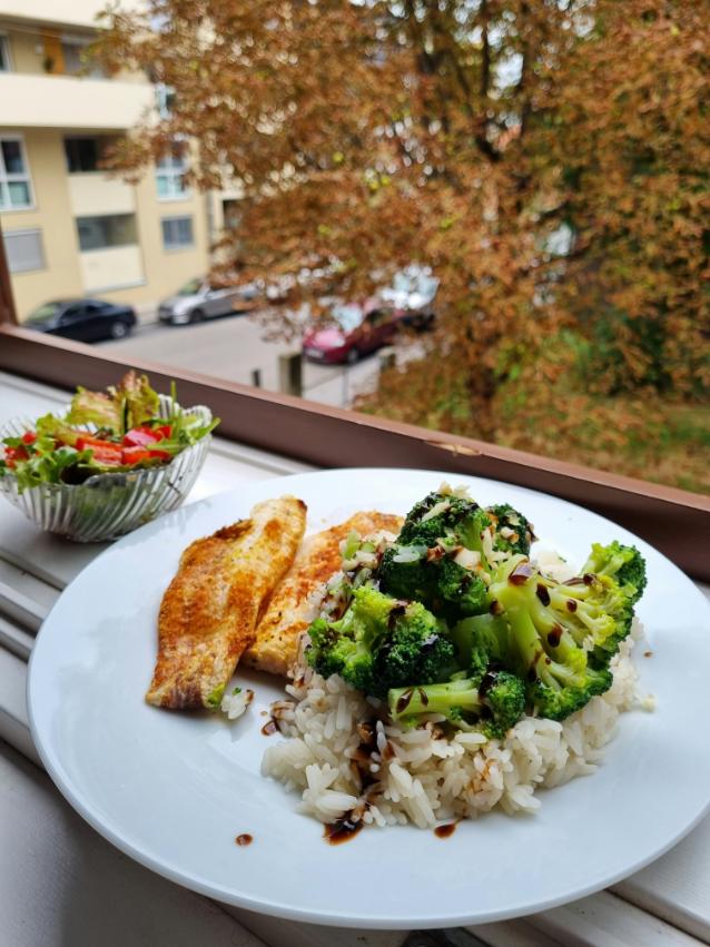 Miso glazed cod fillet with caramelised top, garlic pak choi and brown rice, sprinkled with sesame seeds and spring onions