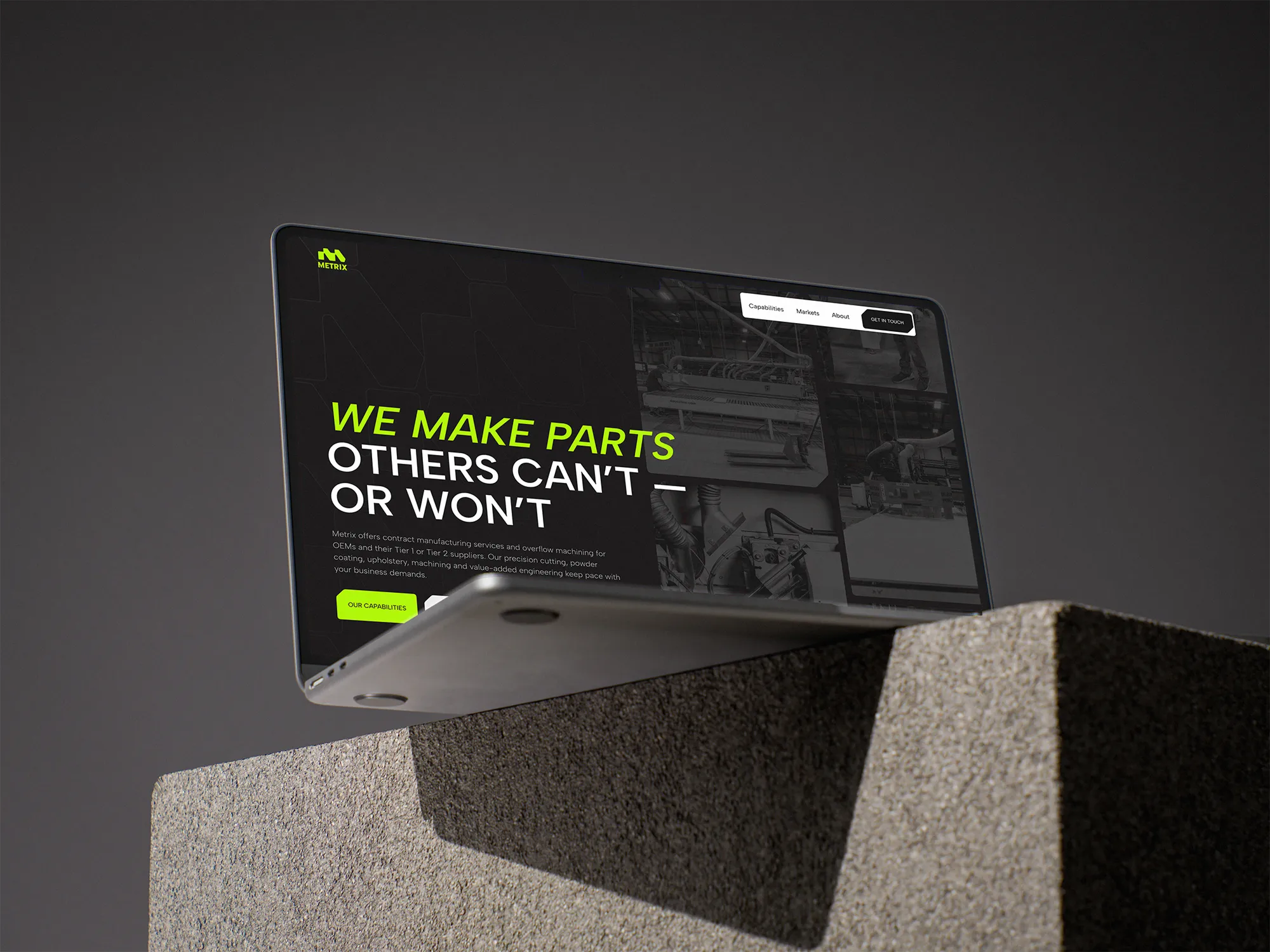 Website displayed on a MacBook mockup