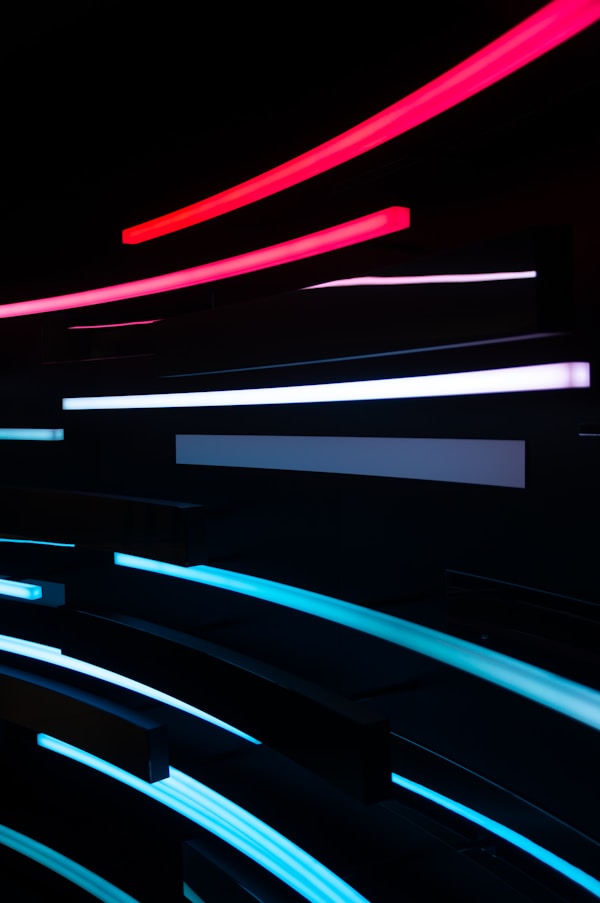 Neon light trails at "Questions for the future", a socio-critical work of art that is intended to encourage people to question modern trends. Displayed at Futurium in Berlin