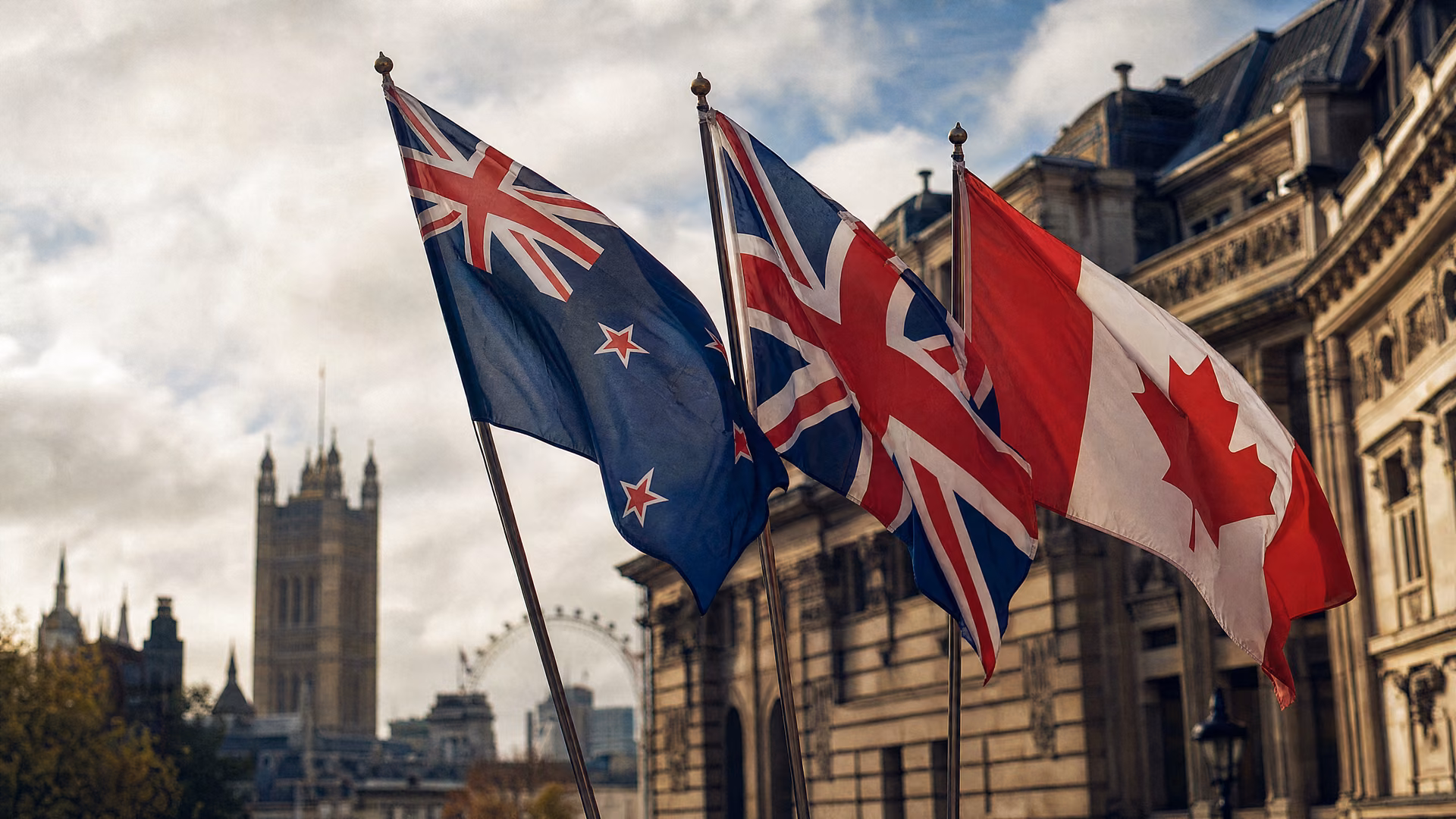 Flags of New Zealand, the United Kingdom and Canada flying together in London