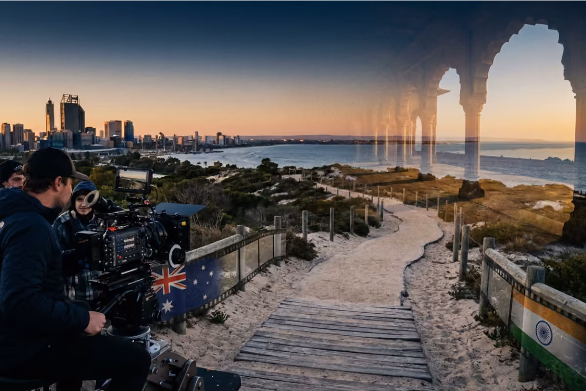 Australia–India film production scene: crew filming the Perth skyline at sunset with Australian and Indian flags