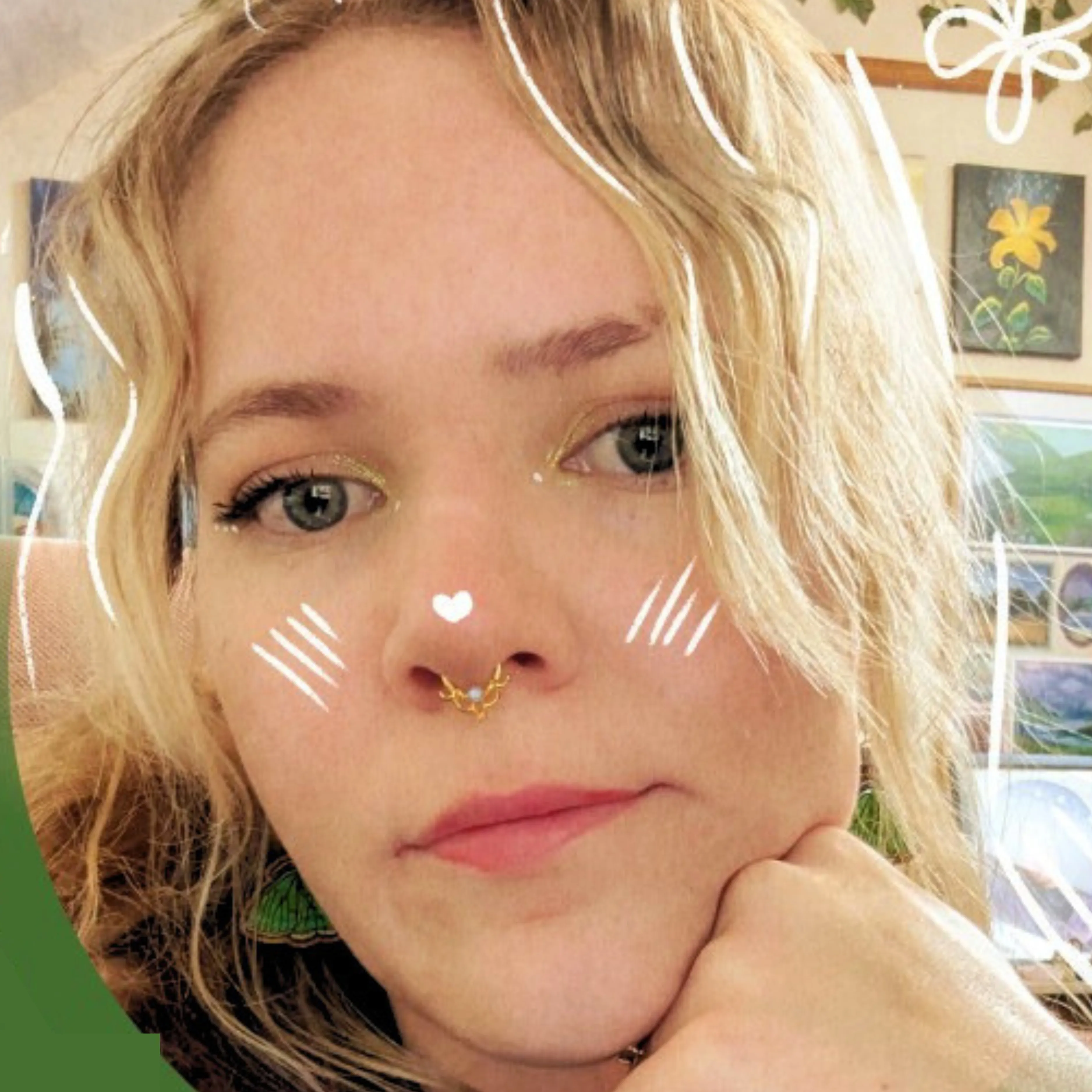 Close-up of woman with blonde hair, gold septum ring, resting her chin on her hand with digital white doodles.