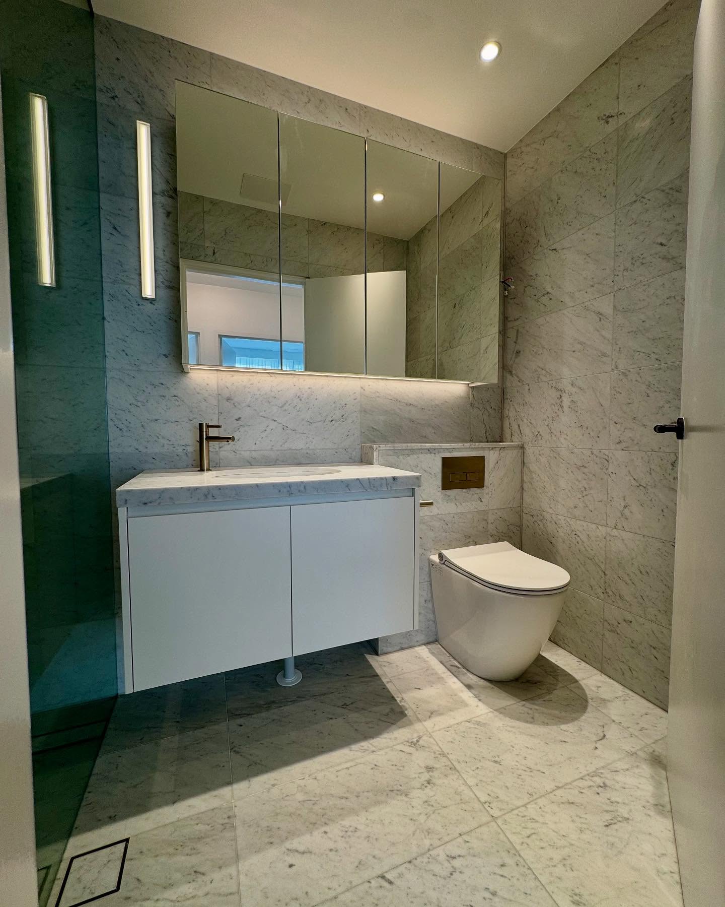 The second bathroom with custom vanity joinery.