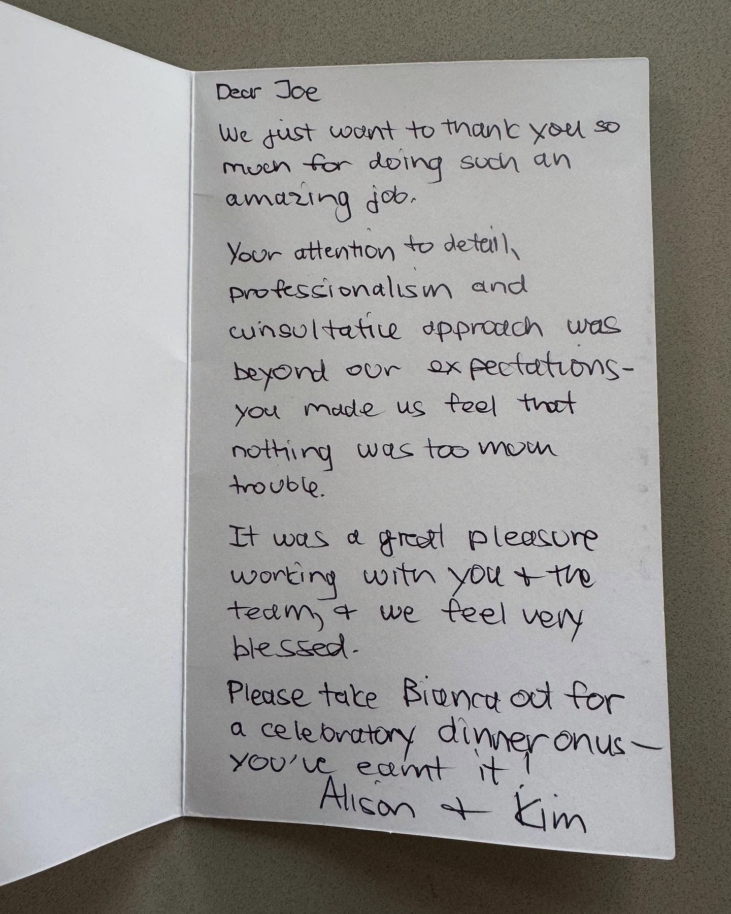 The clients' signed thank-you card.