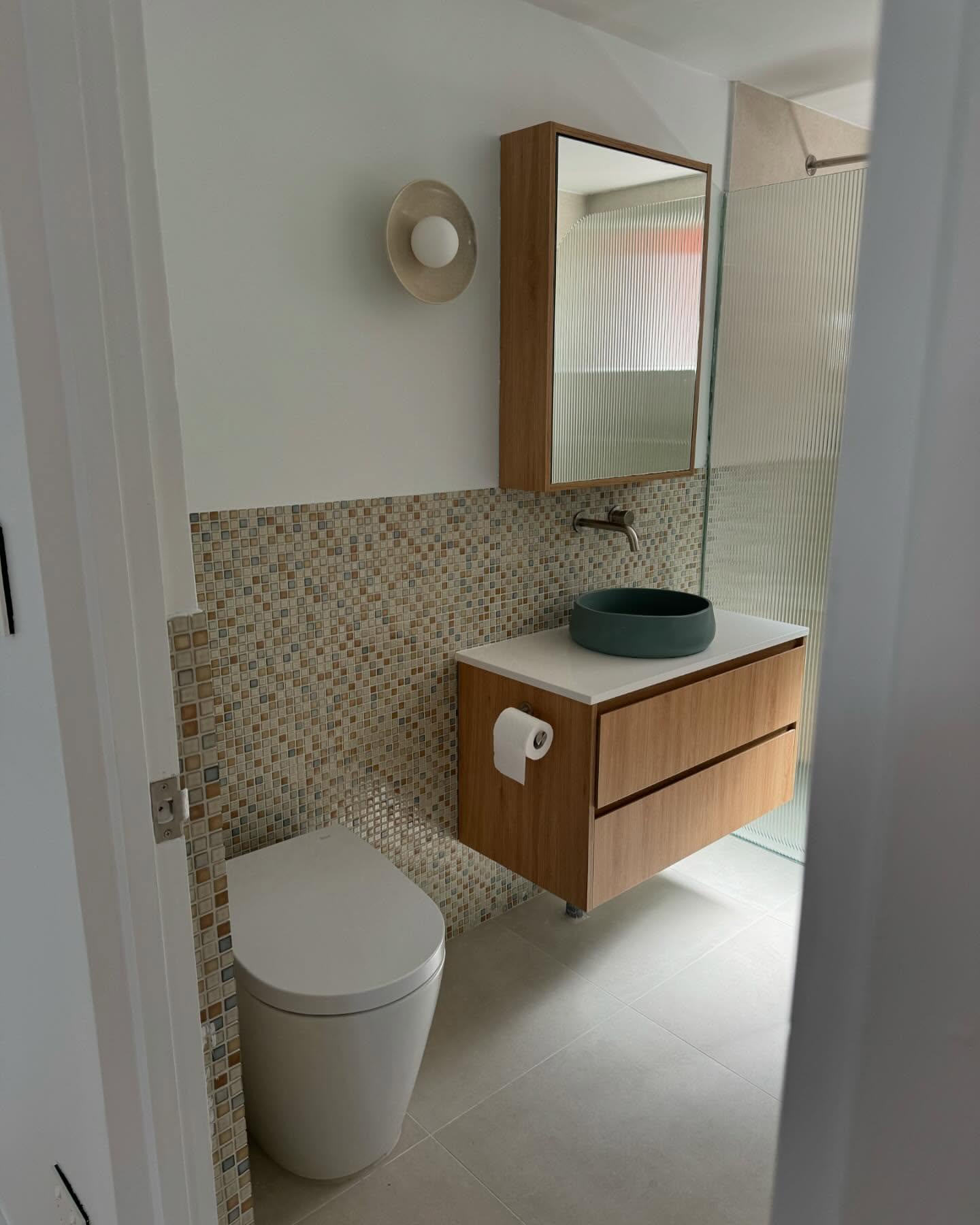 Renewed bathroom finishes and fittings.