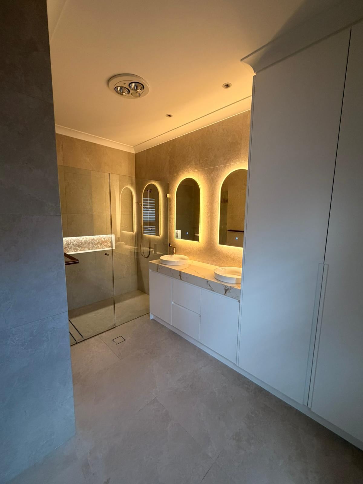 Completed bathroom joinery and shower enclosure.