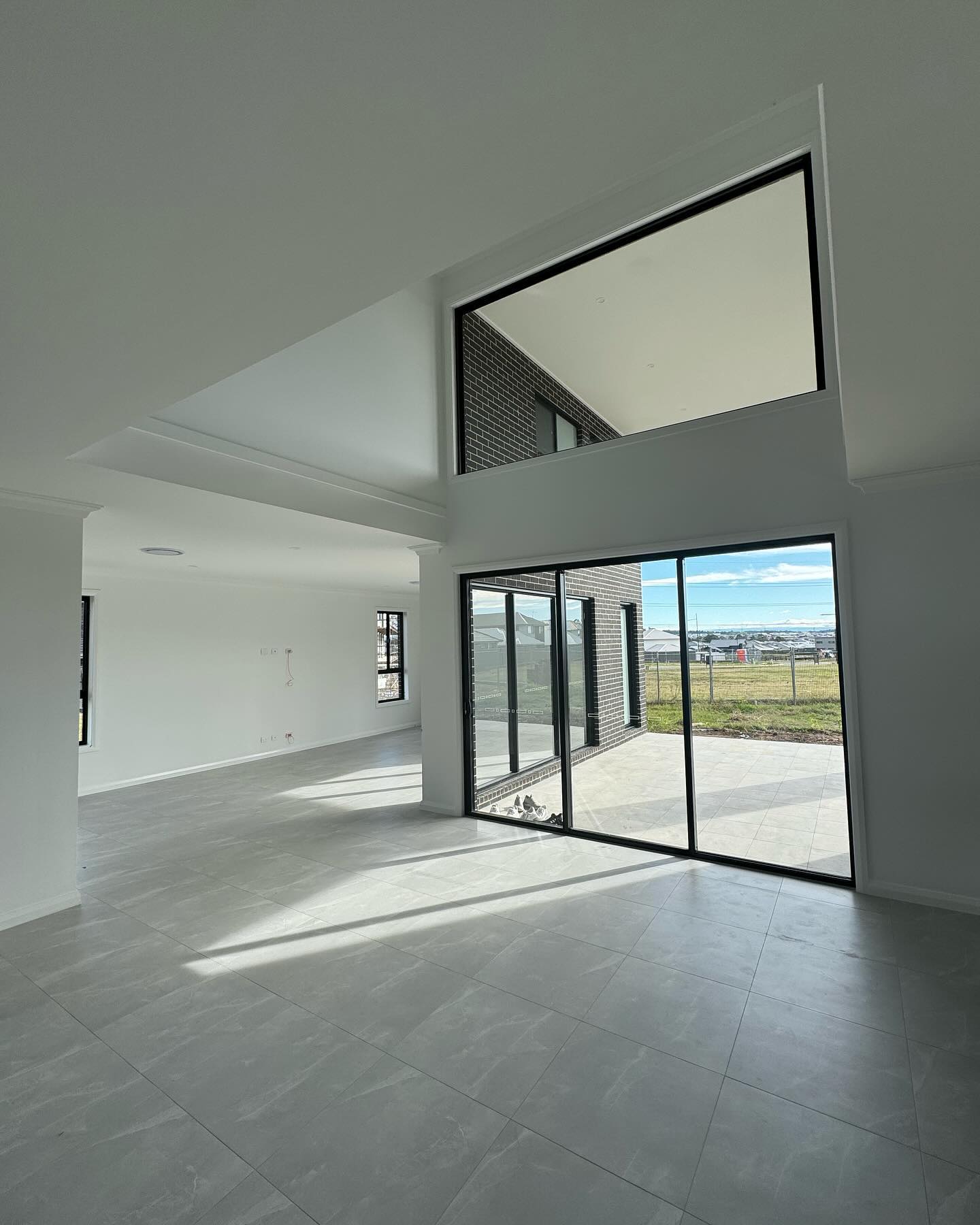 The near-handover living interior.
