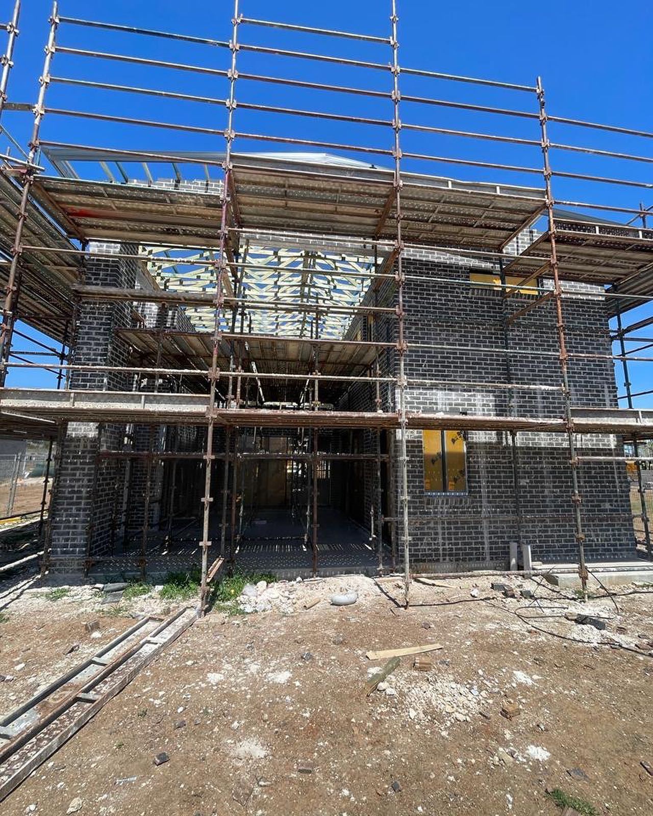 Structural framing earlier in the build.