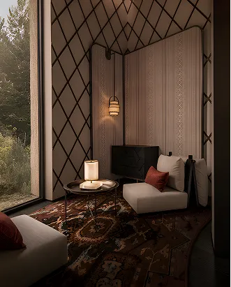 Cozy seating area with cushions, rug, side table, and soft pendant lights near a large window.