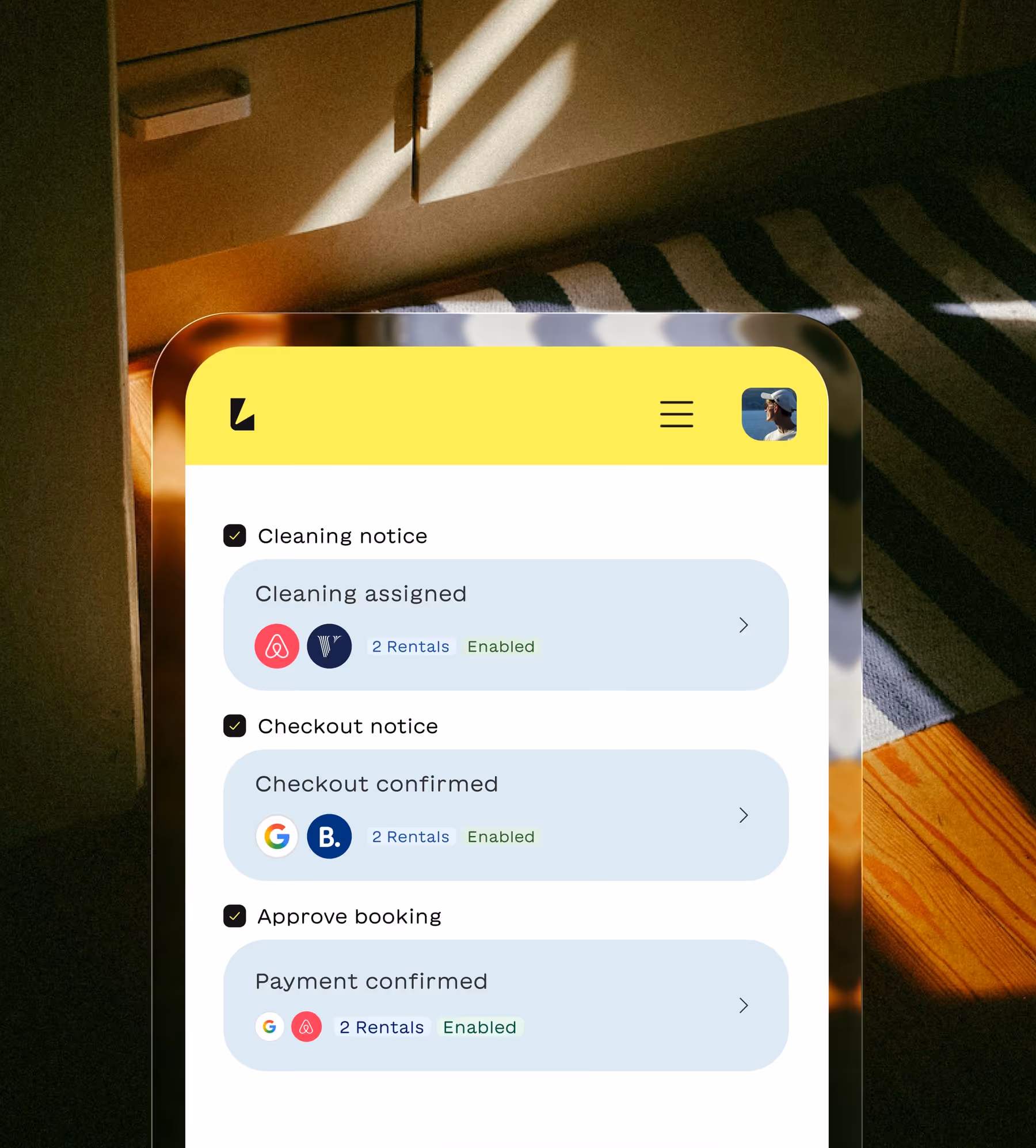 Mobile screen displaying task management notifications: Cleaning notice assigned, Checkout confirmed, and Payment confirmed, each linked with rental platforms and marked enabled.