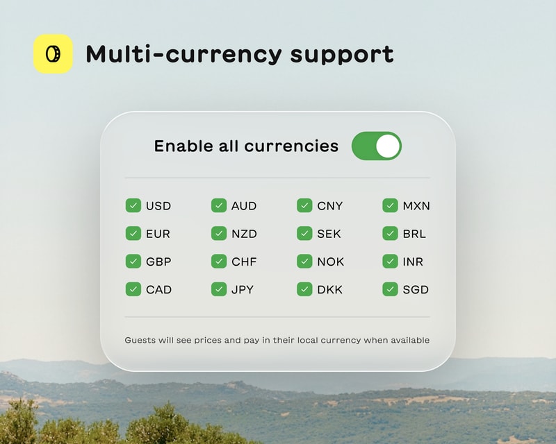 Interface showcasing multi-currency support with a toggle enabled and checkboxes for 16 global currencies on a scenic background.