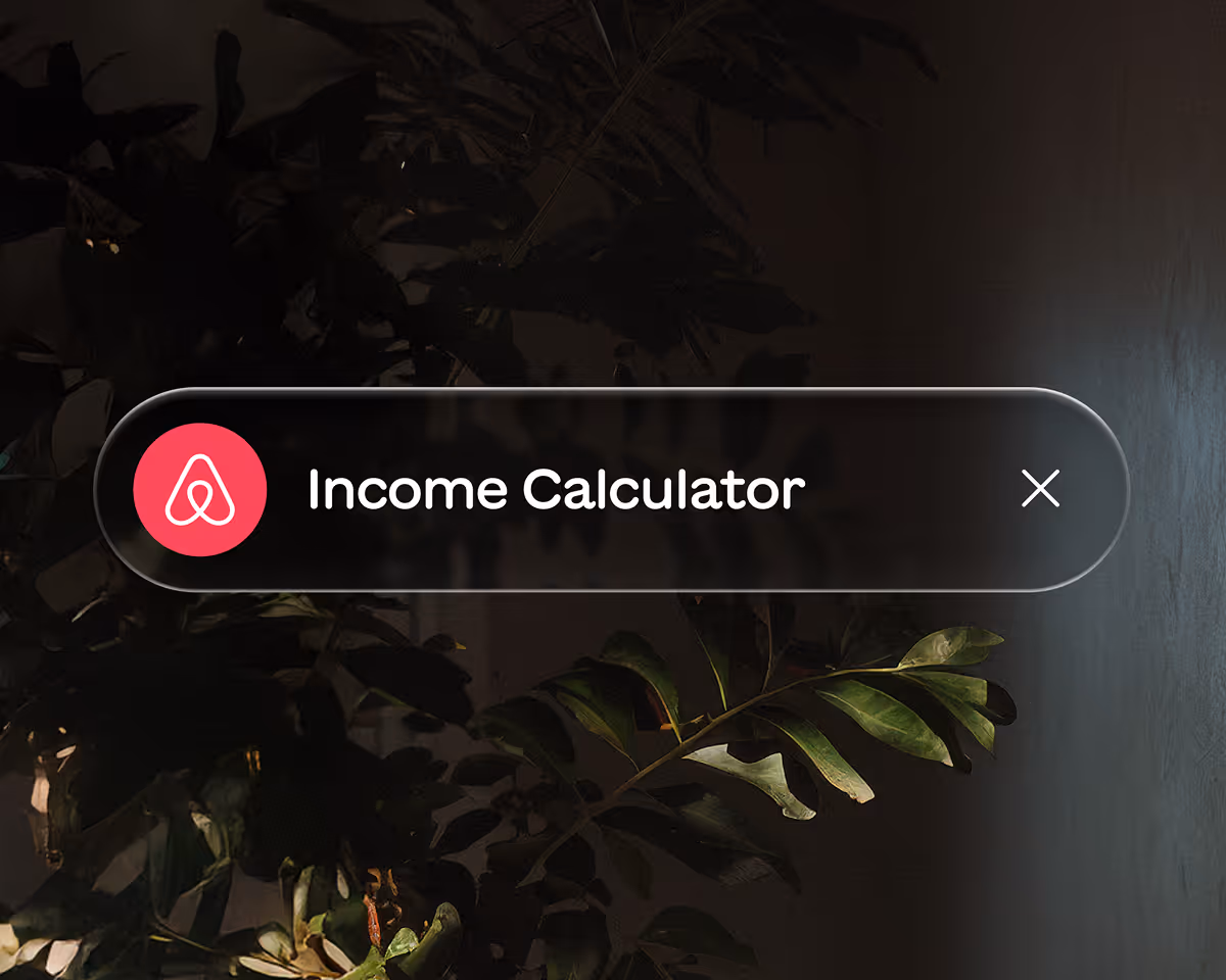 Dark background with green leaves partially illuminated and a rounded rectangular overlay showing Airbnb logo and text 'Income Calculator' with a close button.