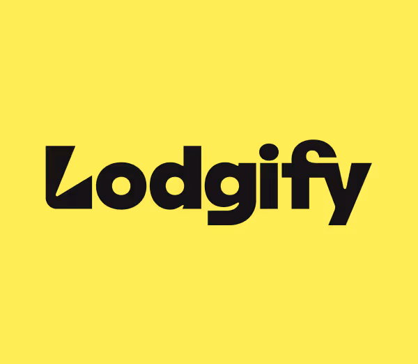Lodgify brand logo in bold black text on a yellow background.