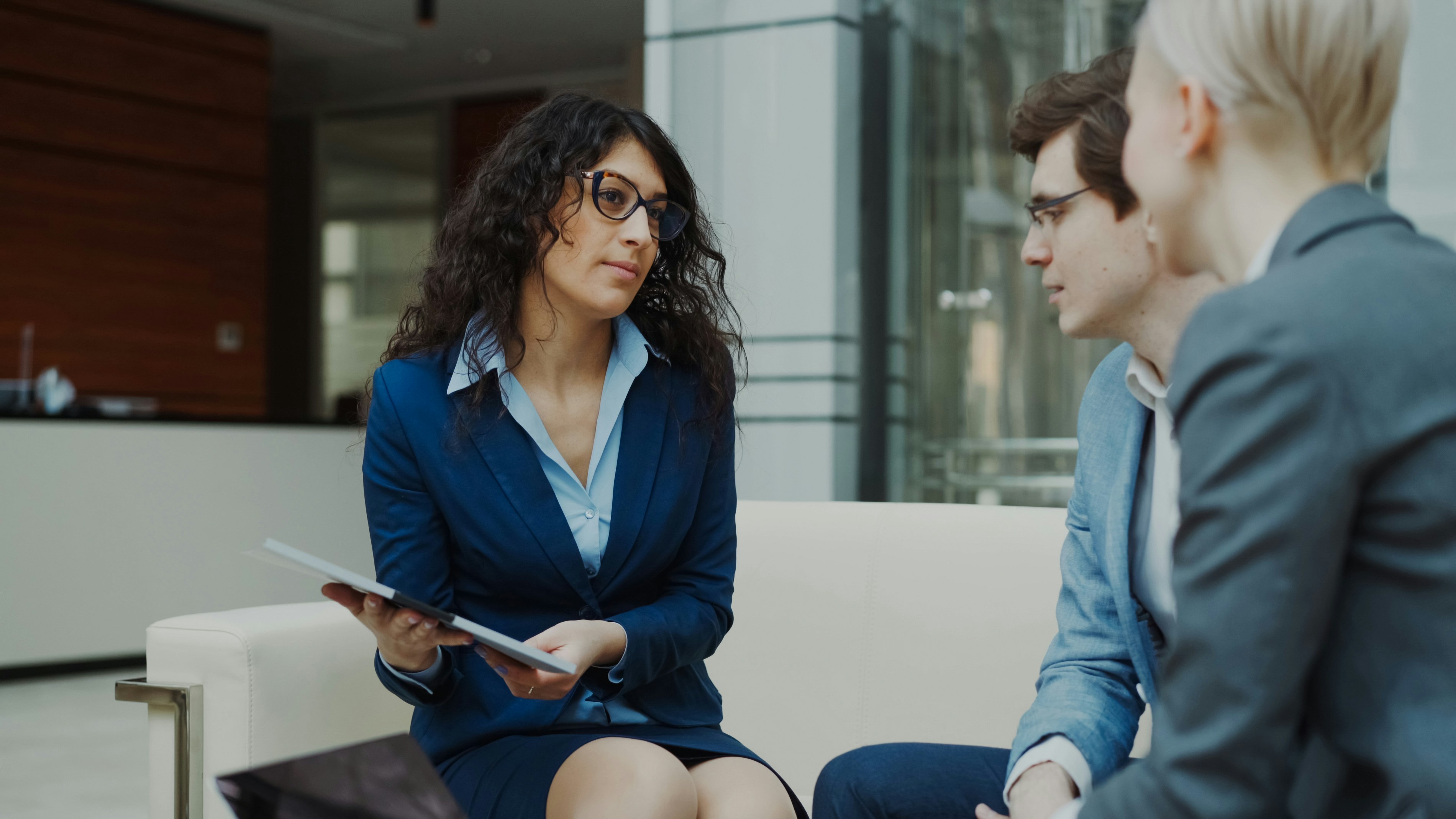 An executive listening with full attention during a confidential first conversation