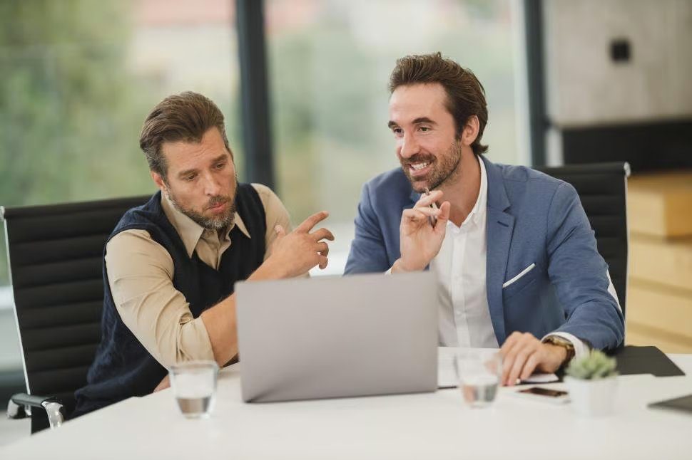 Developer team collaborating on code