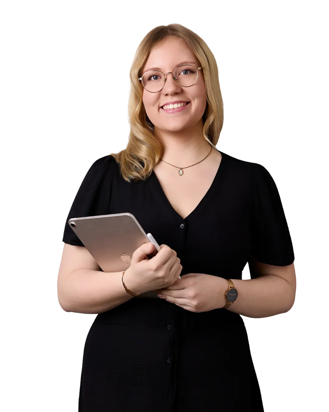 A woman with blonde hair and glasses, wearing a black dress, holds a tablet and smiles at the camera