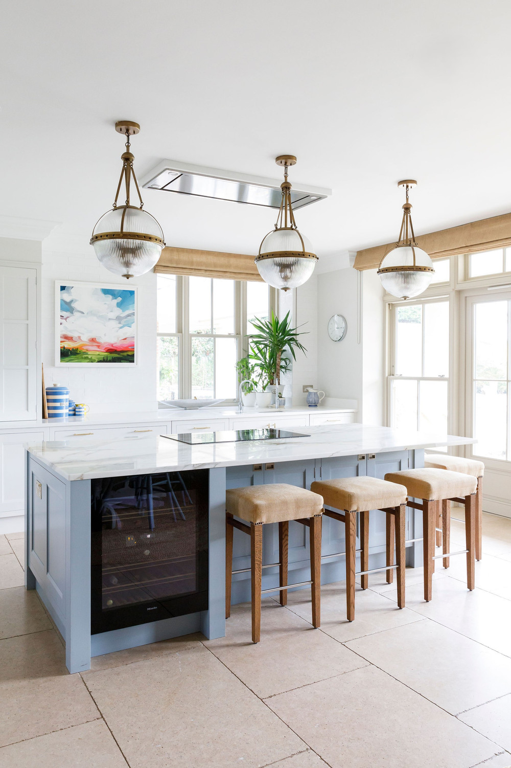 Coastal kitchen detail with natural light and cheerful blue accents — Lorna Smith Interiors