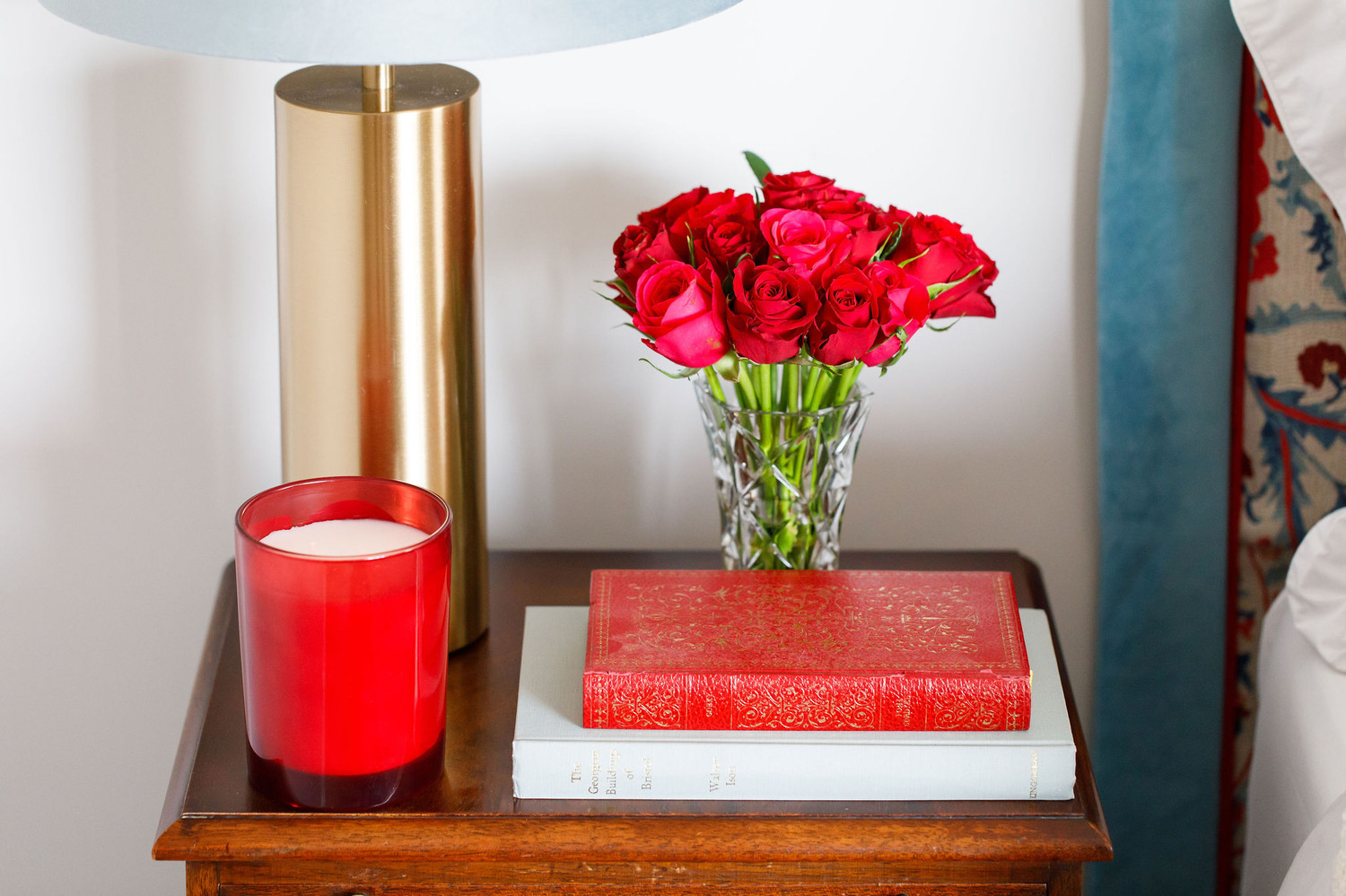 Elegant master bedroom in warm red tones — Lorna Smith Interiors, Petworth