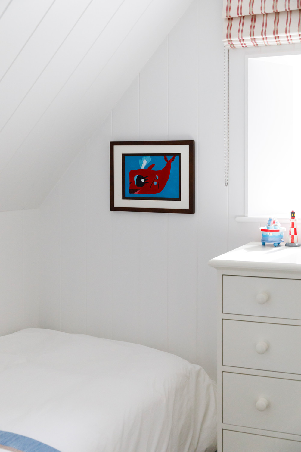 Coastal red guest bedroom accessory detail by Lorna Smith Interiors