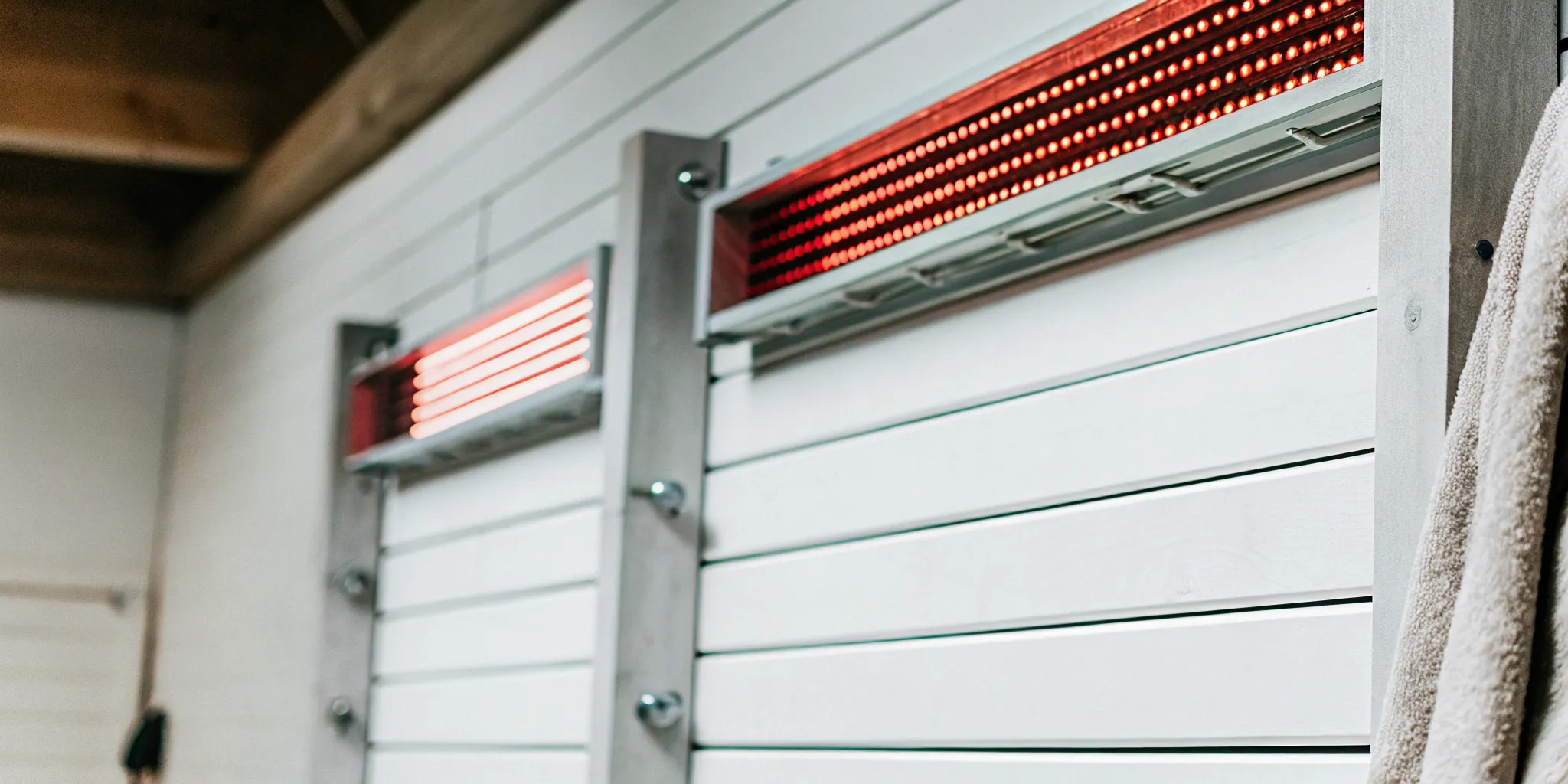 Red light therapy and near-infrared LED panels installed in the Altea Recovery Lounge
