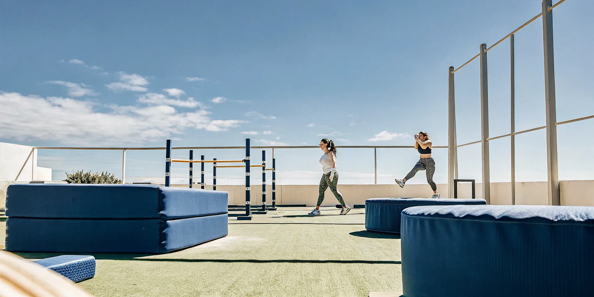 A high-energy group fitness class at Altea Active with modern athletic equipment