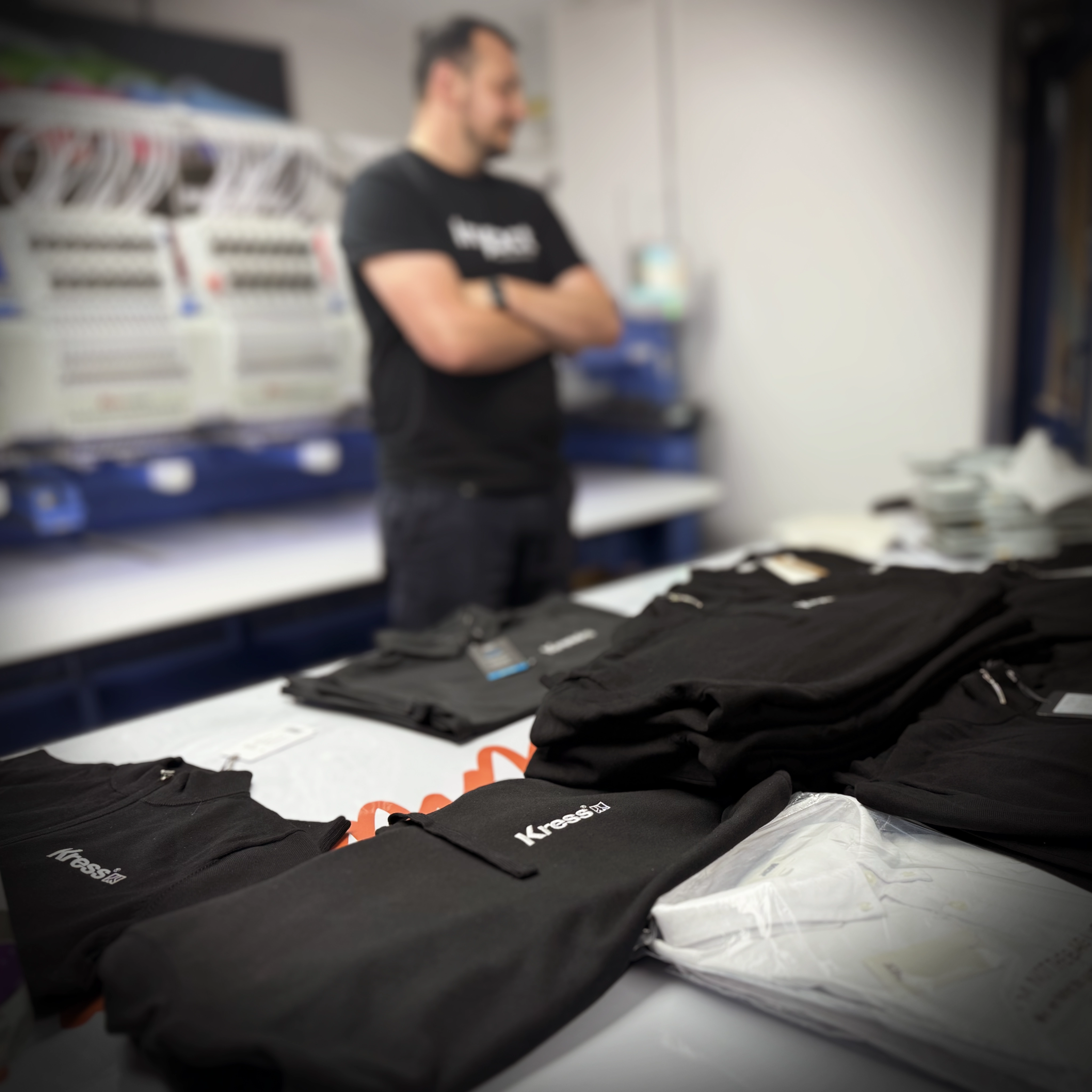 Branded workwear garments prepared for UK delivery