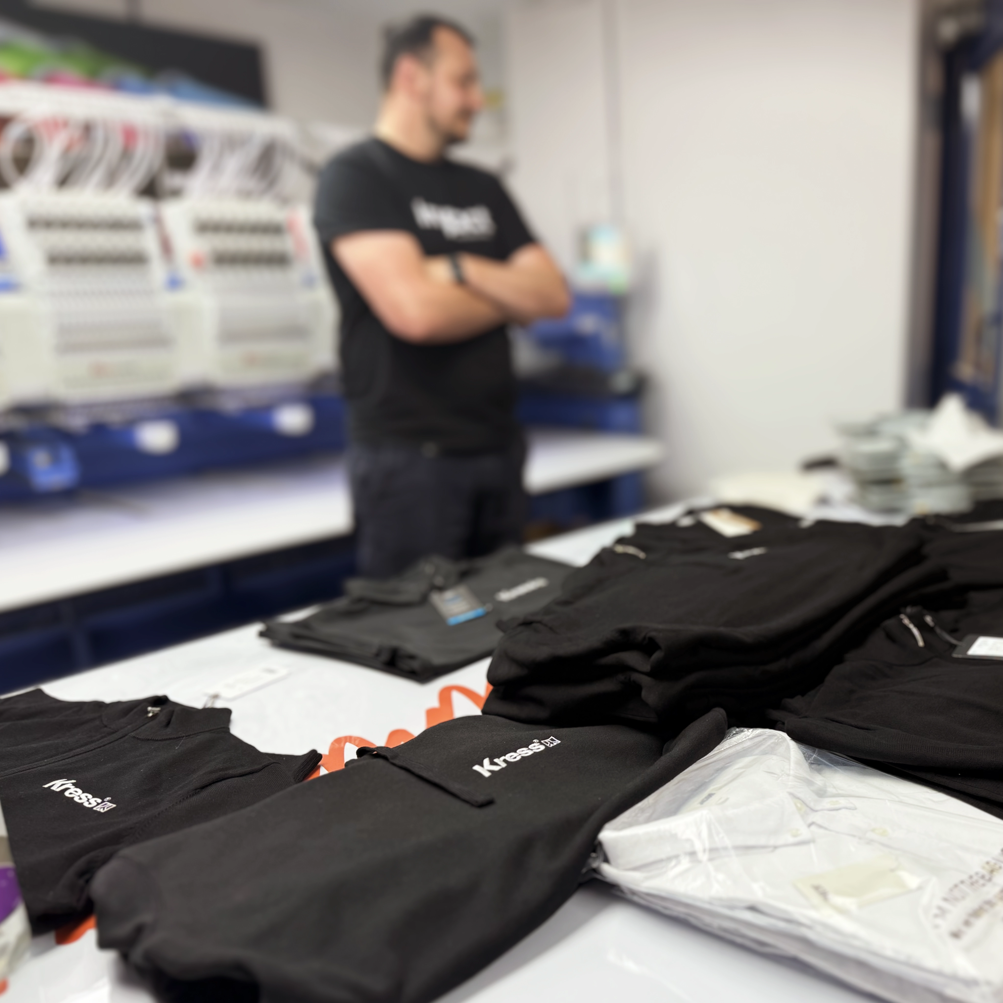 Branded workwear garments prepared for UK delivery