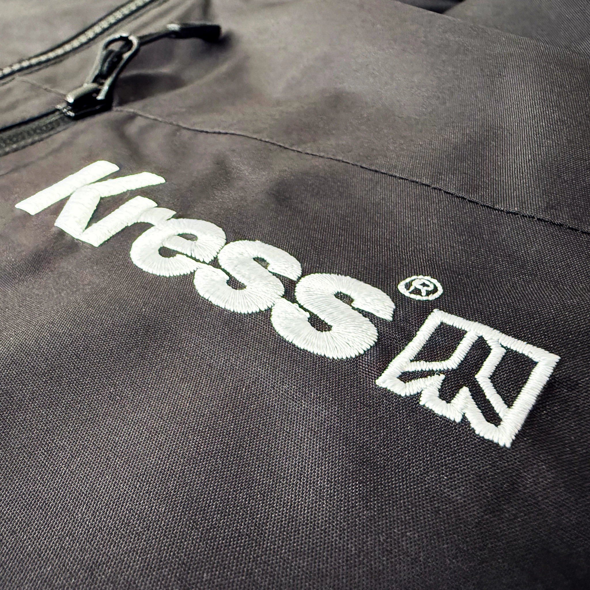 Photo of a waterproof Helly Hansen jacket for Kress with the logo embroidered by Impact Teamwear