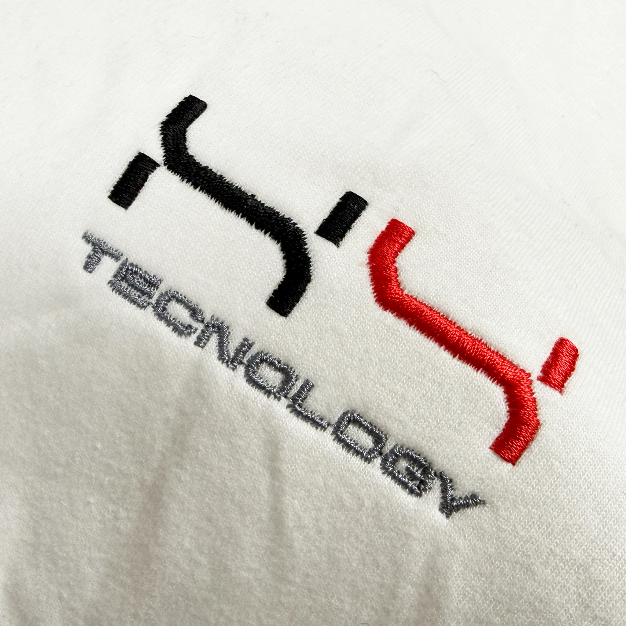 Close-up of premium embroidered workwear branding